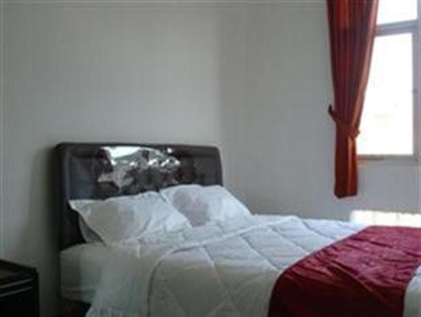 Providence Homestay Surabaya Szoba fotó